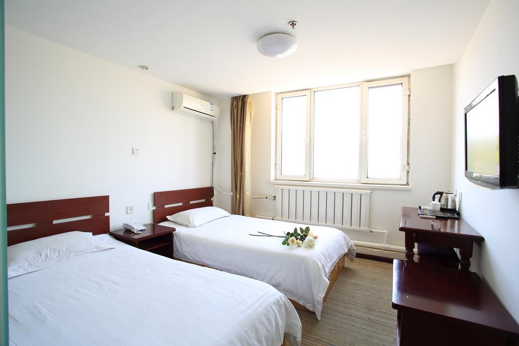 Dalian Haiyuwang Hotel Zimmer foto